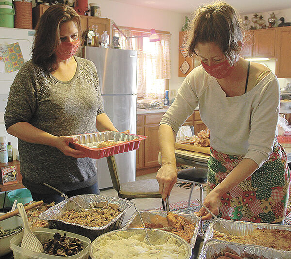 Cousins prepare Thanksgiving dinners for family and friends
